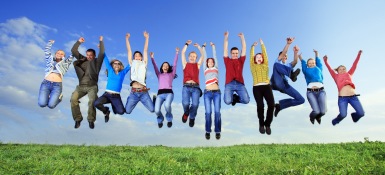 Group of motivated people jumping