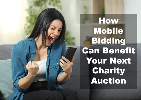 mobile bidding - woman bidding on mobile phone